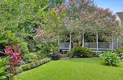 Gallery overlooking landscaped garden courtyard | Latter & Blum Inc./REALTORS